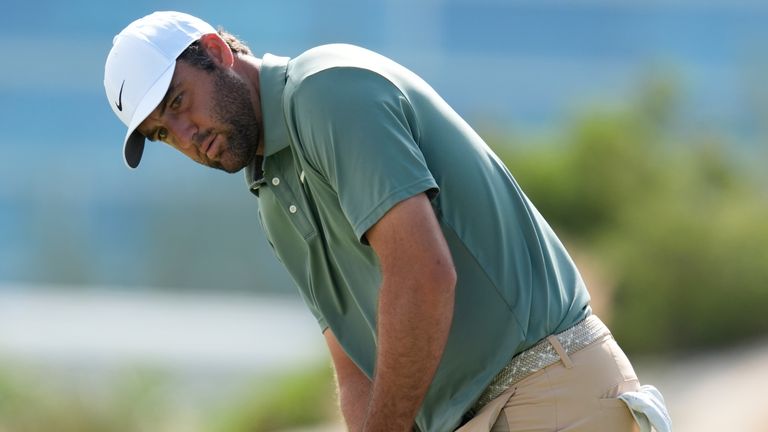 Scottie Scheffler, of the United States, watches his putt on the third green during the first round of the Hero World Challenge PGA Tour at the Albany Golf Club, in New Providence, Bahamas, Thursday, Dec. 4, 2025. (AP Photo/Fernando Llano)