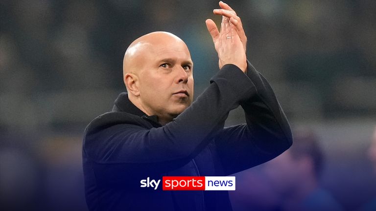 Liverpool's manager Arne Slot applauds at the end of a Champions League, league phase, soccer match between Inter Milan and Liverpool in Milan, Italy, Tuesday, Dec.9, 2025. (