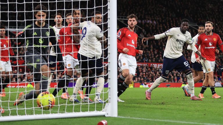 Sungutu Magassa watches as he puts a shot into the back of the net for West Ham's equalizer against Man United