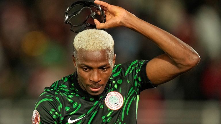 Nigeria's Victor Osimhen reacts after scoring his side's first goal during the Africa Cup of Nations group C soccer match between Nigeria and Tunisia in Fez, Morocco, Saturday, Dec. 27, 2025. (AP Photo/Mosa'ab Elshamy)