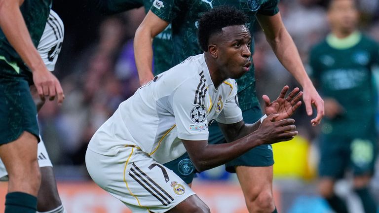 Real Madrid's Vinicius Junior gestures during the Champions League opening soccer match between Real Madrid and Manchester City on Wednesday, Dec. 10, 2025 in Madrid, Spain. (AP Photo/Manu Fernandes)
