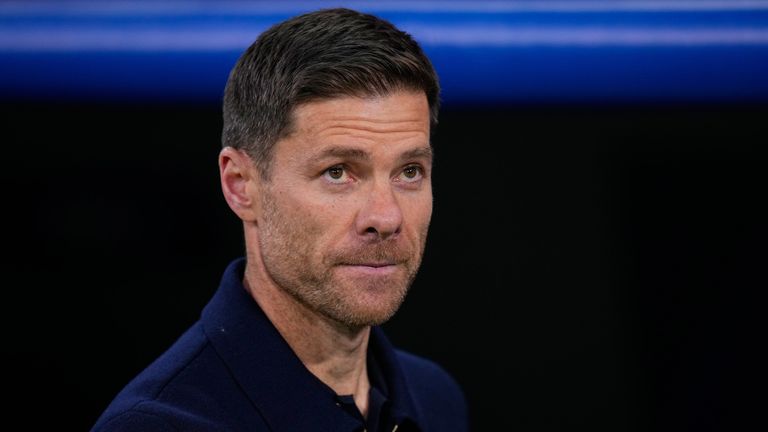 Real Madrid head coach Xabi Alonso enters the pitch before the Champions League opening soccer match between Real Madrid and Manchester City on Wednesday, December 10, 2025 in Madrid, Spain. (AP Photo/Manu Fernandes)