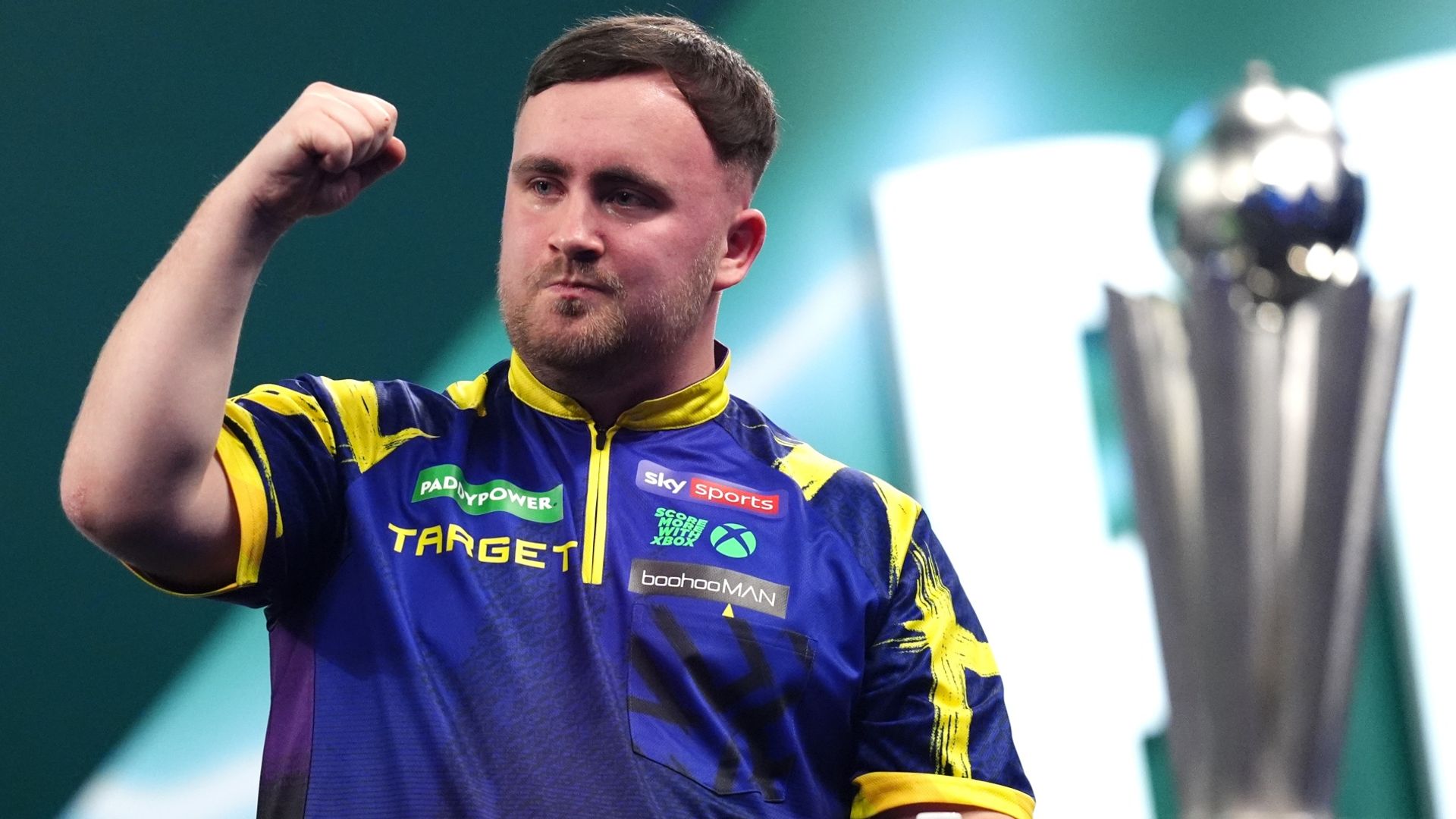 Littler thrashes Van Veen to retain World Darts Championship title