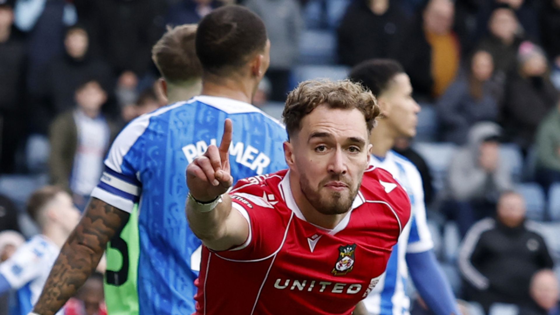 Wrexham edge win at Sheffield Wednesday to stay in sixth