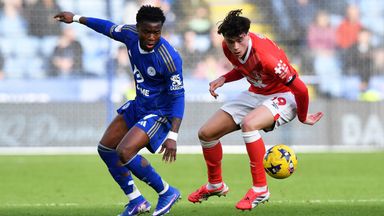 Leicester City's Abdul Fatawu and Luke Chambers of Charlton in action
