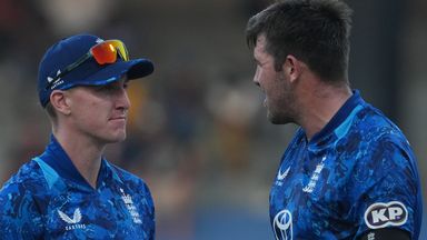 Harry Brook (left) speaking to Jamie Overton during their series-opening defeat in Sri Lanka 