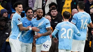 Goalscorers Omar Marmoush and Antoine Semenyo celebrate at the Etihad