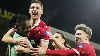 Wrexham celebrate after beating Nottingham Forest on penalties in the FA Cup third round