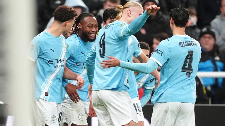Antoine Semenyo is congratulated by his Man City team-mates