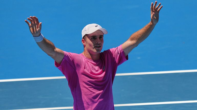 Arthur Fery of Britain celebrates after defeating Flavio Cobolli of Italy in their first round match at the Australian Open tennis championship in Melbourne, Australia, Sunday, Jan. 18, 2026. (AP Photo/Aaron Favila)