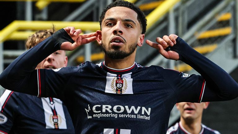 Dundee's Ashley Hay celebrates scoring the winning goal at Dundee United