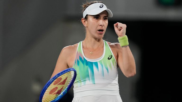 Belinda Bencic of Switzerland reacts after defeating Katie Boulter of Britain in their first round match at the Australian Open tennis champ