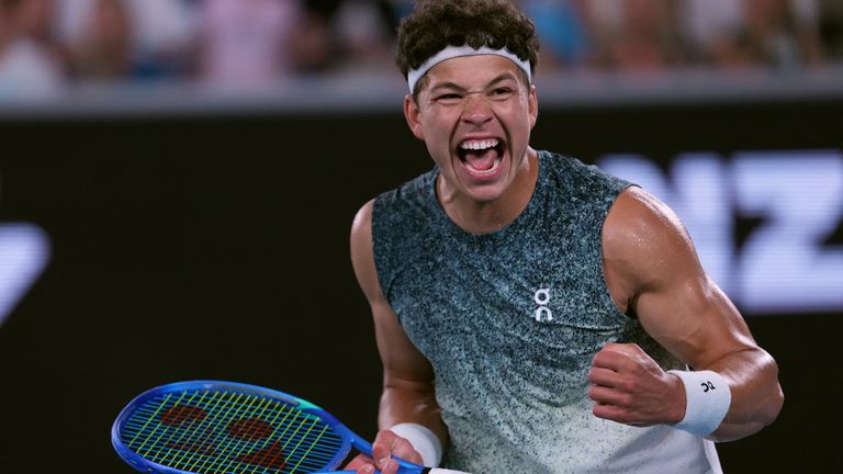 Ben Shelton of the U.S. celebrates after defeating Valentin Vacherot of Monaco in their third round match at the Australian Open tennis championship in Melbourne, Australia, Saturday, Jan. 24, 2026. (AP Photo/Aaron Favila)