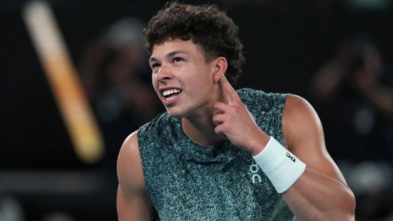 Ben Shelton of the U.S. celebrates after defeating Casper Ruud of Norway during their fourth round match at the Australian Open tennis championship in Melbourne, Australia, Monday, Jan. 26, 2026. (AP Photo/Aaron Favila)