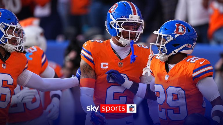 Denver Broncos cornerback Ja'quan McMillian (29) celebrates with cornerback Pat Surtain II (2) after scoring a touchdown after intercepting the ball during the first half of an NFL football game against the Los Angeles Chargers, Sunday, Jan. 4, 2026, in Denver.