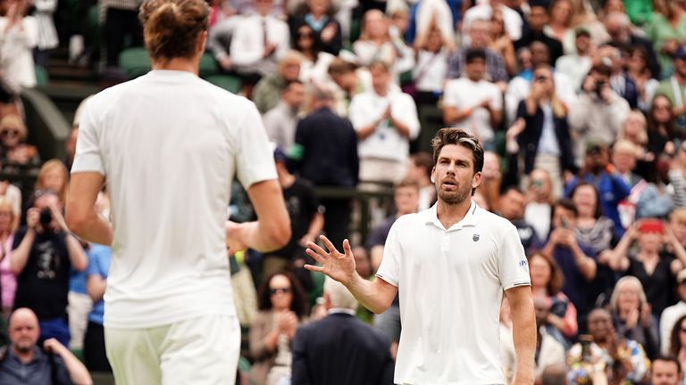 Cameron Norrie looks disappointed after losing to Alexander Zverev at the All England Raw on day 6 of the 2024 Wimbledon Championships.