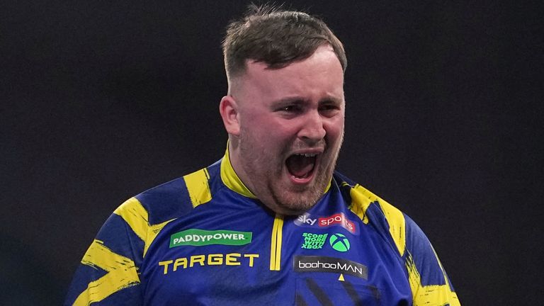 Luke Littler reacts after winning the World Darts Championships final against Gian van Veen