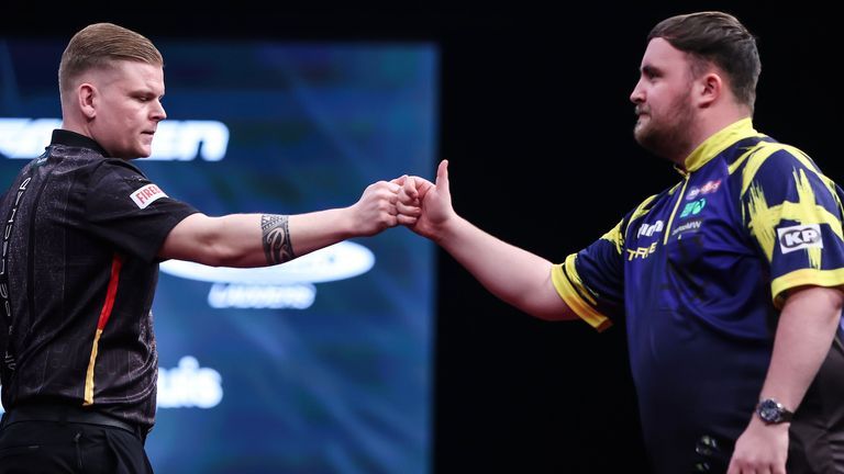 Luke Littler and Mike De Decker in the first round of the World Masters (credit: Taylor Lanning/PDC)