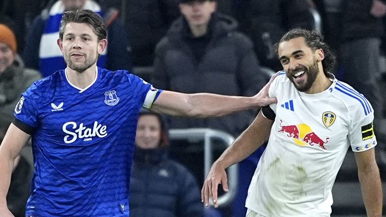 Everton's James Tarkowski shoves Leeds United's Dominic Calvert-Lewin