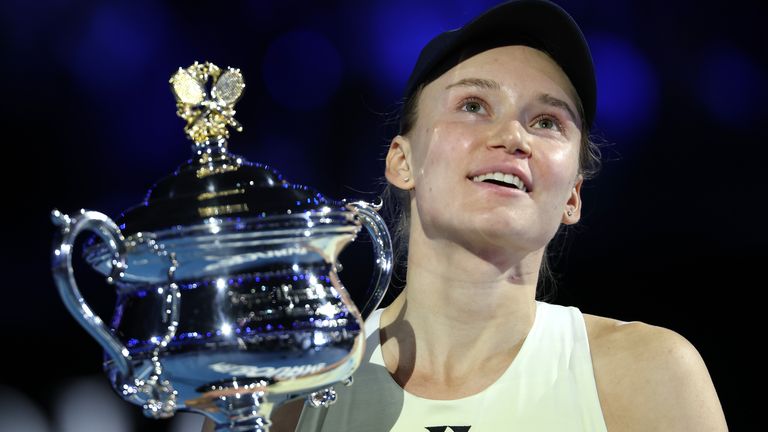 Elena Rybakina of Kazakhstan poses with the Daphne Akhurst Memorial Cup after her victory in the Women's Singles Final against Aryna Sabalen