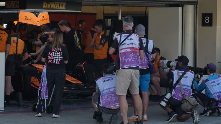 December 9, 2025, Yas Marina Circuit, Abu Dhabi, Formula 1 Young Driver Test and Pirelli Tire Test 2025, in the picture photographers are waiting in front of the garage of world champion Lando Norris (GBR), McLaren F1 Team. Photo by: Hasan Bratic/picture-alliance/dpa/AP Images