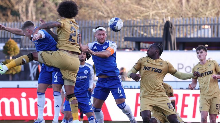 Paul Dawson heads Macclesfield into the lead against FA Cup holders Crystal Palace