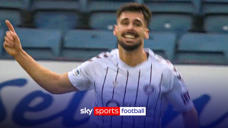 Claudio Braga scores for Hearts against Dundee after a controversial free-kick position.