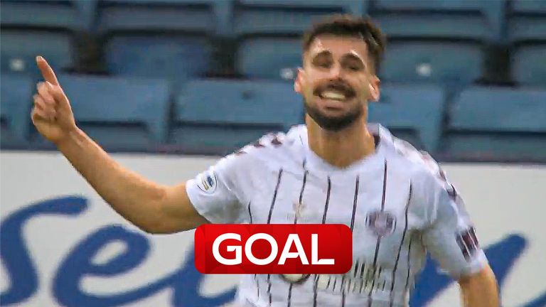 Claudio Braga scores for Hearts against Dundee after a controversial free-kick position.