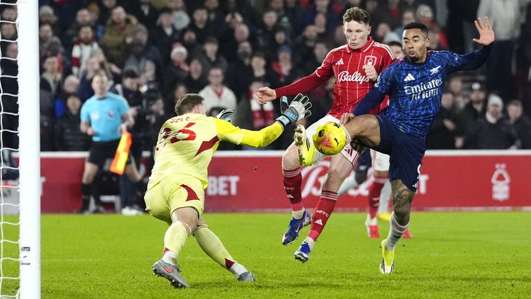 Arsenal's Gabriel Jesus (right) attempts a shot on goal