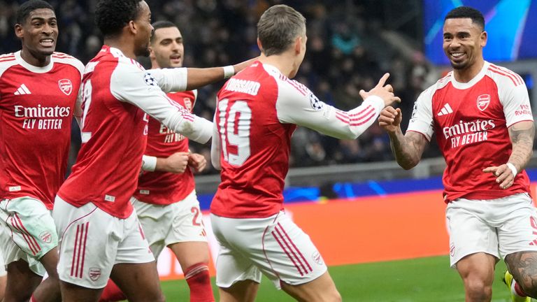 Arsenal's Gabriel Jesus, right, celebrates with his teammates after scoring his side's second goal during the Champions League opening phase soccer match between Inter Milan and Arsenal in Milan, Italy, Tuesday, Jan. 20, 2026. (AP Photo/Luca Bruno)