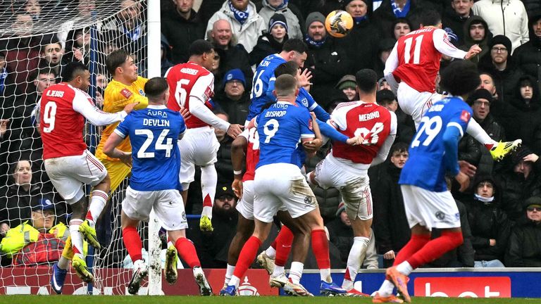 Gabriel Martinelli rises to head Arsenal into a 2-1 lead at Portsmouth