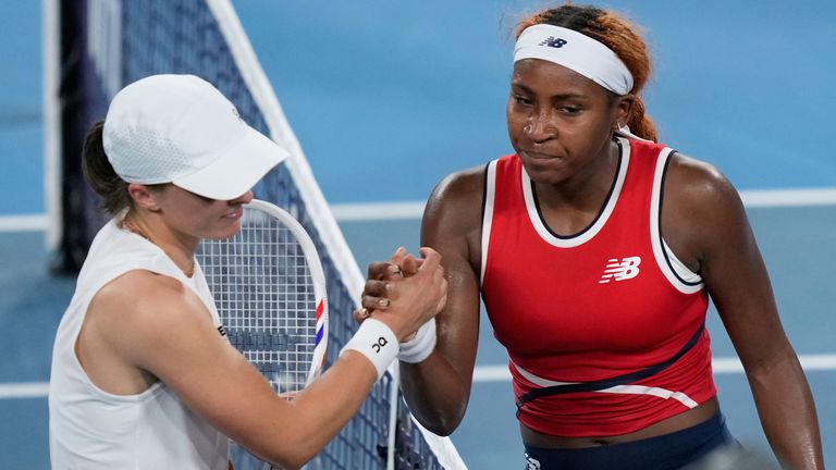 Coco Gauff shakes hands with Iga Swiatek after beating the Pole at United Cup in Australia (Associated Press)