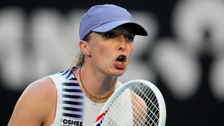 Iga Swiatek of Poland reacts as she plays against Maddison Inglis of Australia during their fourth round match at the Australian Open tennis