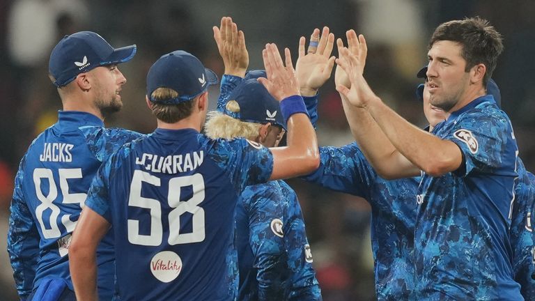 England's Jamie Overton celebrates with teammates the wicket of Sri Lanka's Sri Lanka's Pathum Nissanka in the third ODI (Associated Press)