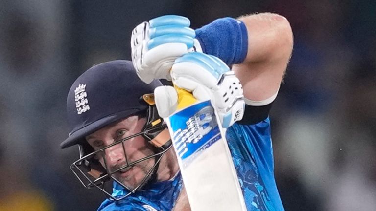 England's Joe Root plays a shot as Sri Lanka's Kusal Mendis watches during the first ODI cricket match between England and Sri Lanka