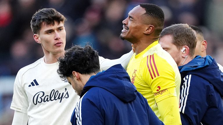 Nottingham Forest goalkeeper John Victor reacts as he leaves the pitch with an injury