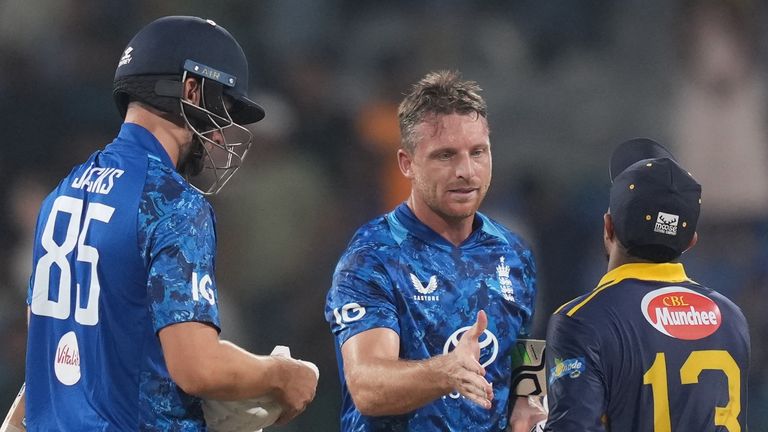 England's Jos Butler and shakes hands with Sri Lanka's Kusal Mendis following their win in the second ODI (Associated Press)
