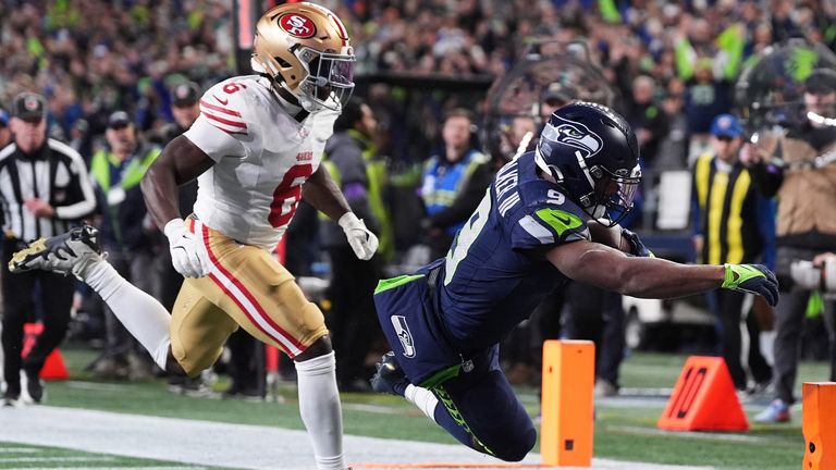 Seattle Seahawks running back Kenneth Walker III scores a touchdown  (AP Photo/Lindsey Wasson)