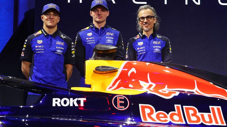 Red Bull team principal Laurent Mekies (R) and four-time world champion Max Verstappen launch the team's 2026 car in Detroit