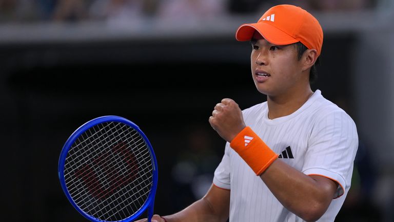 Learner Tien of the U.S. celebrates after defeating Daniil Medvedev of Russia in their fourth round match at the Australian Open tennis cham