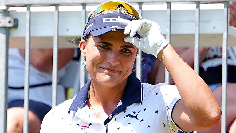 LPGA golfer Lexi Thompson acknowledges the fans as she is introduced on the first tee during the final round of the LPGA Dow Championship on