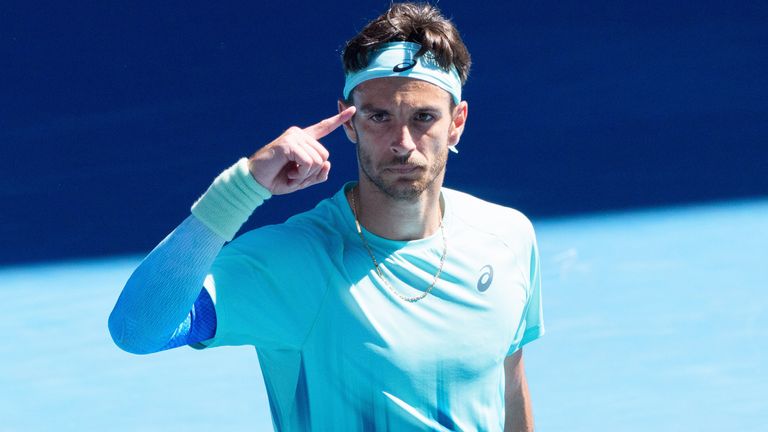 LORENZO MUSETTI of Italy celebrates after defeating 9th seed TAYLOR FRITZ of the USA on Rod Laver Arena in a Men's Singles 4th round match o