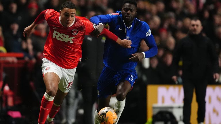 Charlton Athletic's Miles Leaburn (left) and Chelsea's Benoit Badiashile (right) battle for the ball