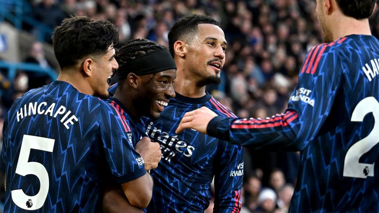 Noni Madueke of Arsenal celebrates with team-mates after his corner is turned into the Leeds goal by Karl Darlow