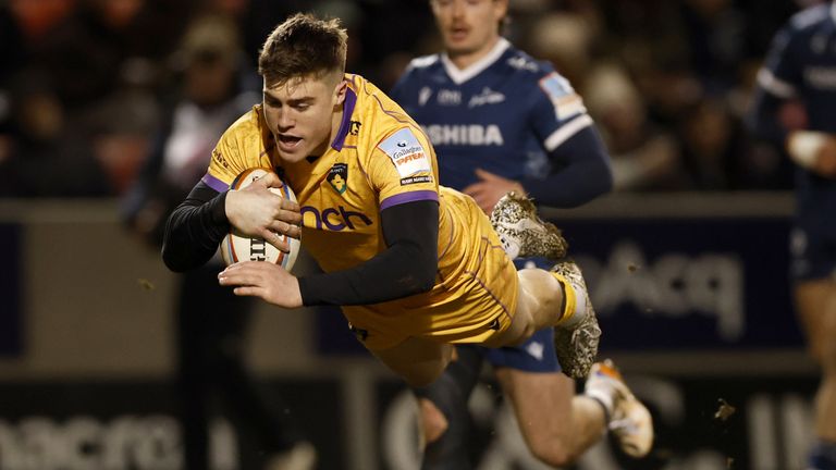 Northampton Saints' Tommy Freeman scores a try against Sale