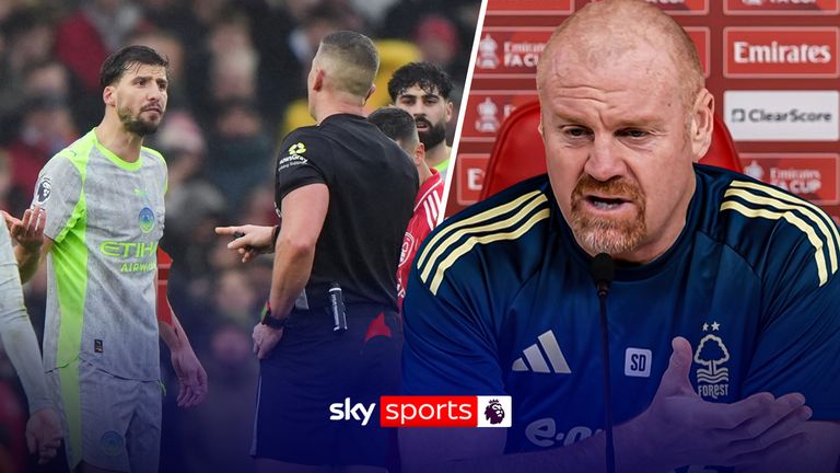 Manchester City's Ruben Dias argues with referee Rob Jones during the Premier League match at the City Ground, Nottingham. 