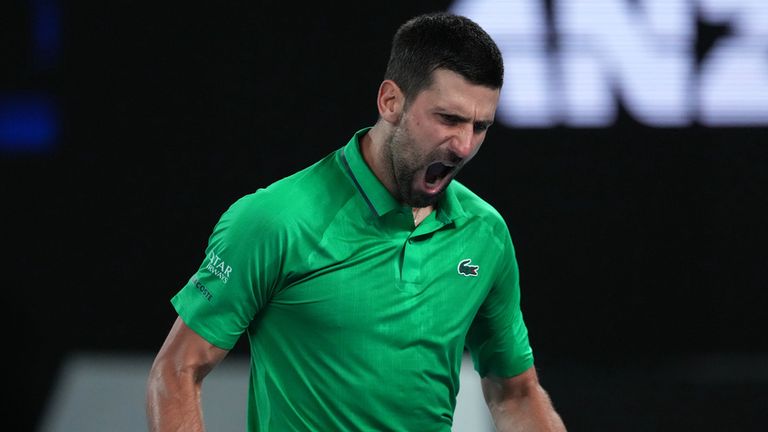 Novak Djokovic of Serbia reacts during his semifinal match against Jannik Sinner of Italy at the Australian Open tennis championship in Melbourne, Australia, early Saturday, Jan. 31, 2026. (AP Photo/Asanka Brendon Ratnayake)