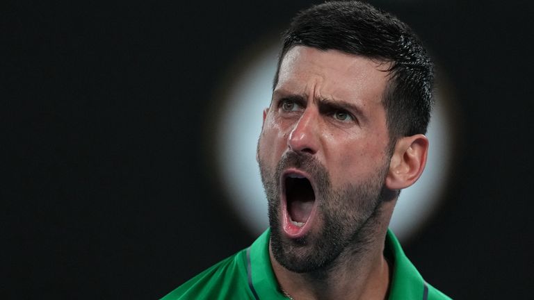 Novak Djokovic of Serbia reacts during his semifinal match against Jannik Sinner of Italy at the Australian Open tennis championship in Melbourne, Australia, Saturday, Jan. 31, 2026. (AP Photo/Asanka Brendon Ratnayake)