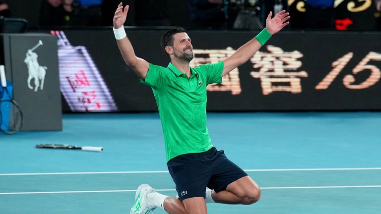 Novak Djokovic of Serbia celebrates after defeating Jannik Sinner of Italy in their semifinal match at the Australian Open tennis championsh