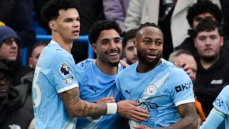 Goalscorers Omar Marmoush and Antoine Semenyo celebrate at the Etihad